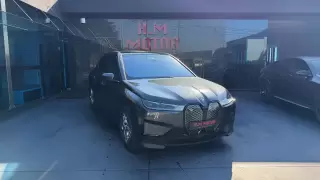 BMW iX xDrive 50 Pack Desportivo — fotografia 1
