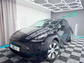 Tesla Model Y Standard Range Plus — fotografia 1