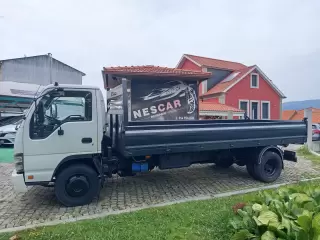 Isuzu NQR 75 5.2 TRIBASCULANTE — fotografia 1